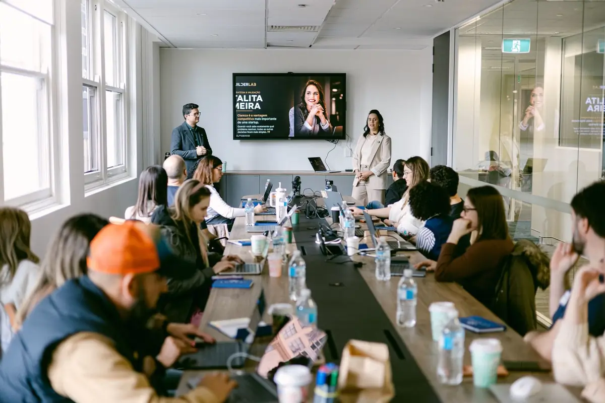 Founders around the table during a Builder Lab workshop session